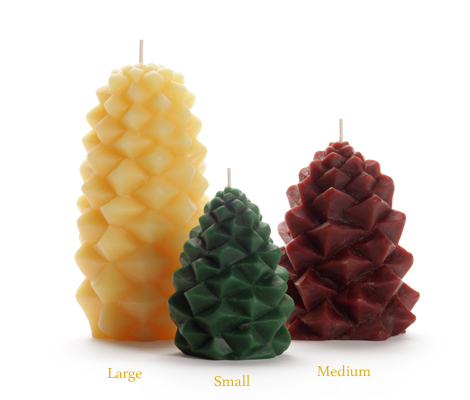 trio of candles shaped like pinecones