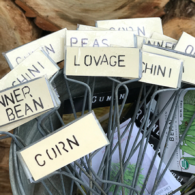 vintage plant stakes with names of plants