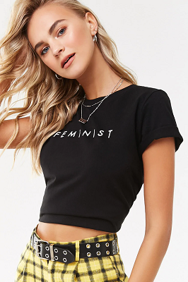 woman in black shirt that reads "feminist"