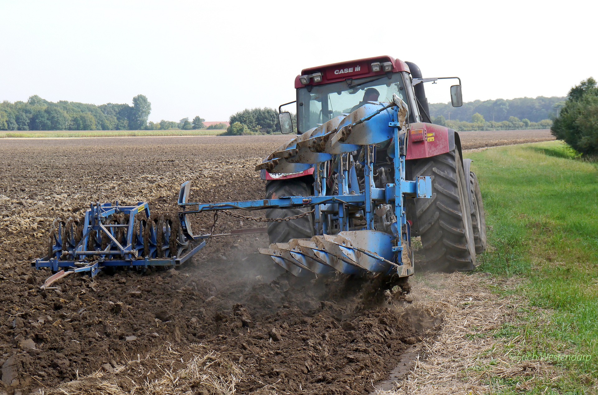 tractor tilling field 