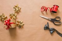 Image: gift, wrapping, scissors, and bow. Title: Green Your Holidays: Five Tricks for Sustainable Shopping