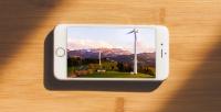 Smart phone with wind turbine image on it