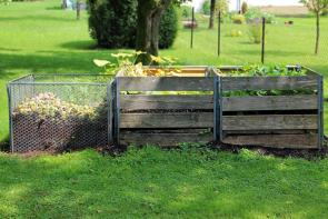 Image: compost bins in a yard. Topic: Methods of Regenerative Agriculture: #4 Composting
