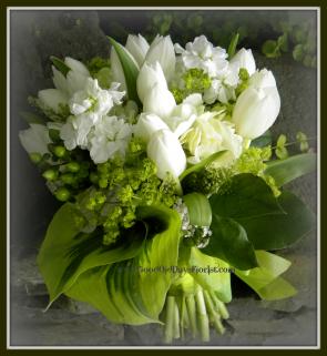 Green wedding bouquet of tulips and herbs