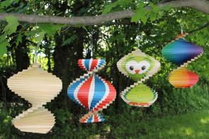 Wind spinners are made from hardwood maple scraps from other products.  12 different designs.