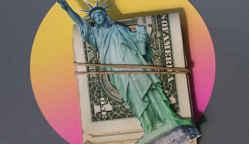 a picture of the statue of liberty tied to a pile of money