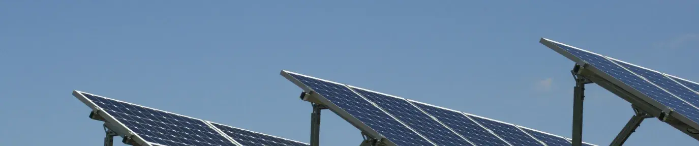 Image: solar panels against cloudless sky. Renewable Energy.