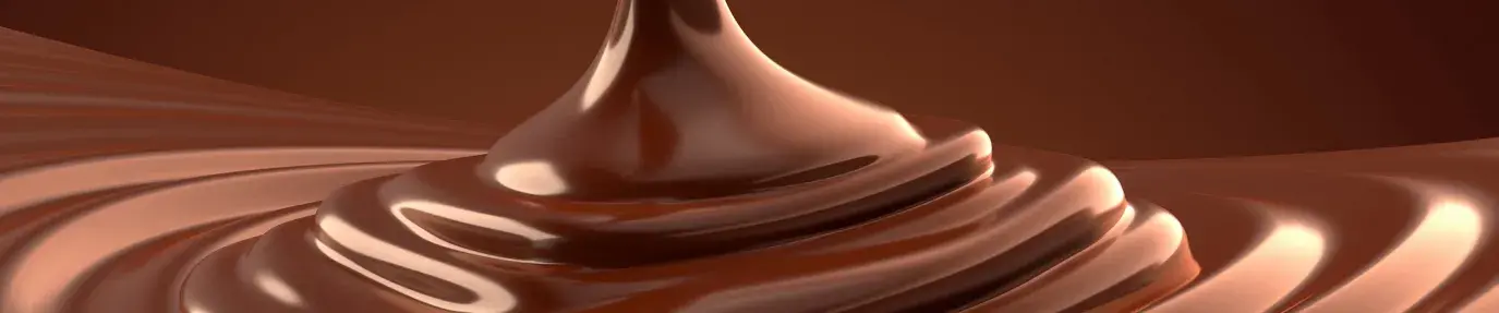 pouring delicious fair trade direct trade chocolate into a pile