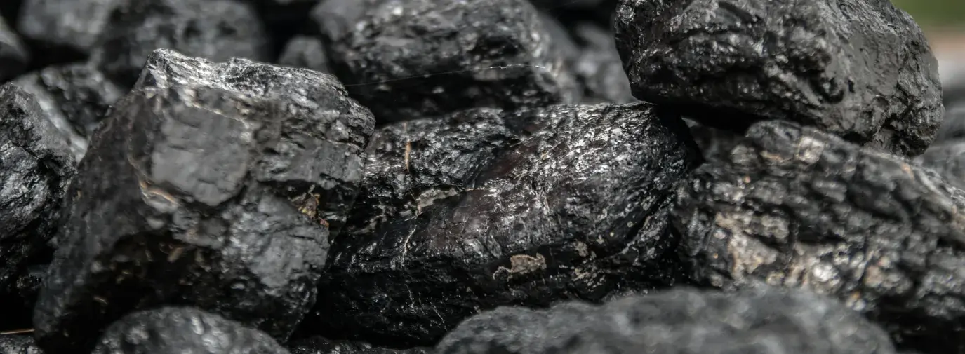 Image: a pile of black coal. Topic: Why Clean Coal Is A Myth