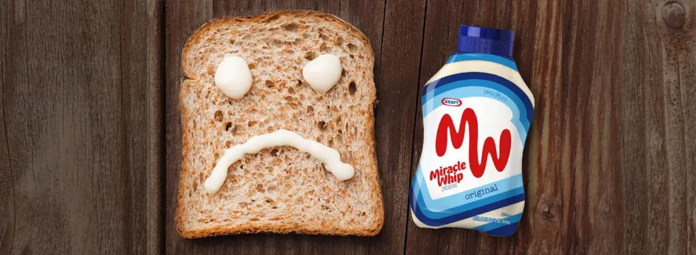 Image: Miracle Whip frown on bread next to a jar of Kraft Miracle Whip