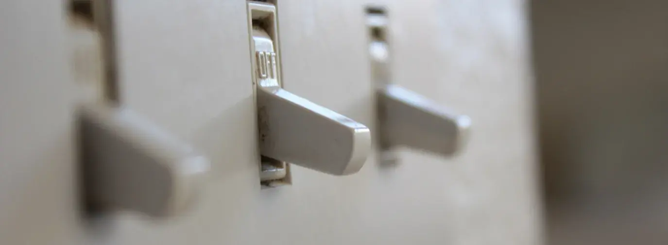 Image: light switches. Title: First Steps to Energy Efficiency