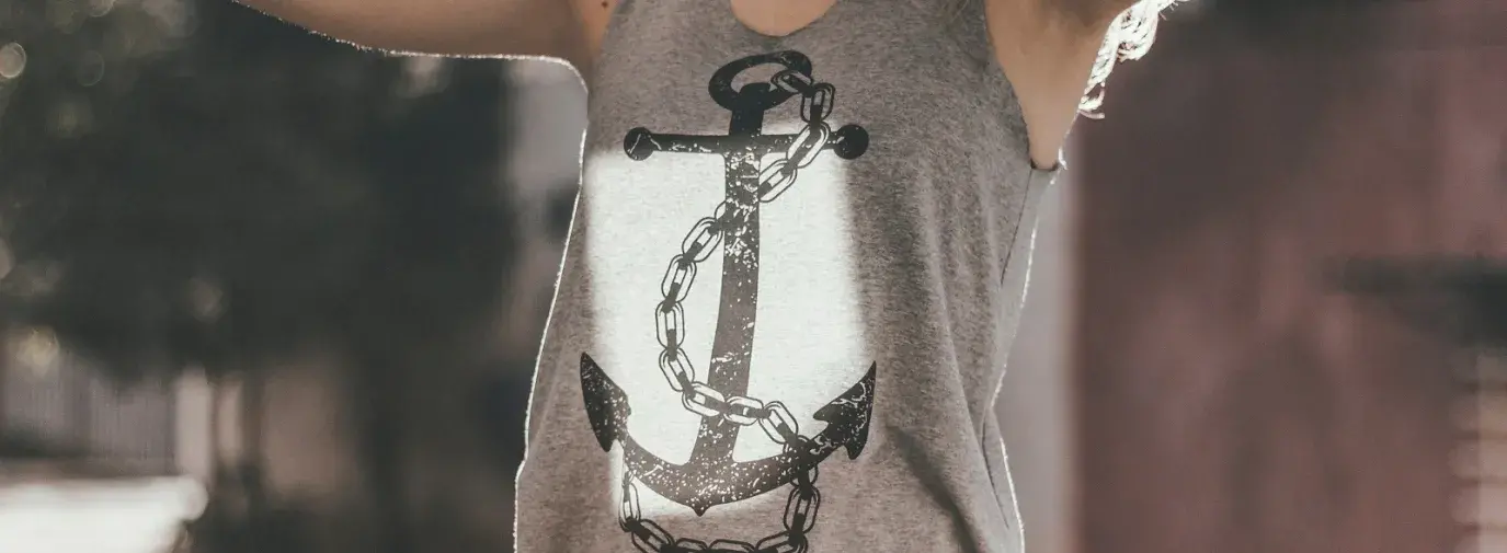 Image: woman wearing shirt with anchor on it. Topic: Does "Made in the USA" Mean Not In a Sweatshop?