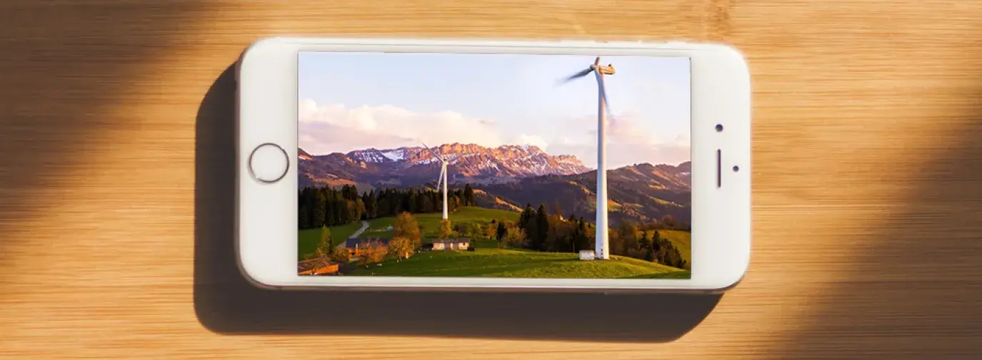 cell phone with image of wind turbines