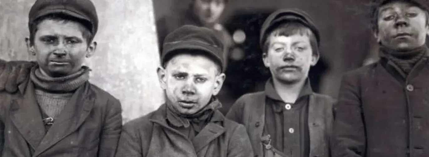 Group of “breaker boys,” who separated coal impurities by hand, in Pittston, Pennsylvania. Photo by Lewis Wickes Hine, 1911.