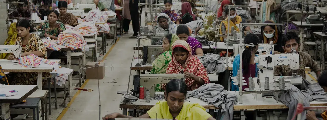 workers in a factory from Clean Clothes Campaign