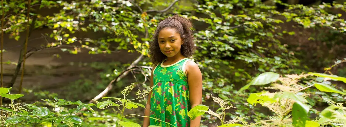 Child modeling Dhana Inc. clothing