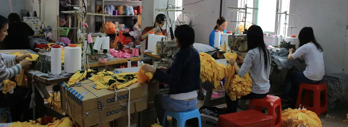 Image: women working in Chinese clothing factory Topic: What You Can Do to End Sweatshops