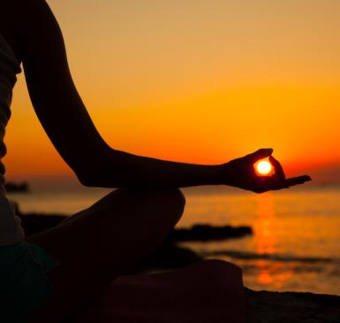 Yoga and meditation on the beach, health & wellness | Credit: Tint