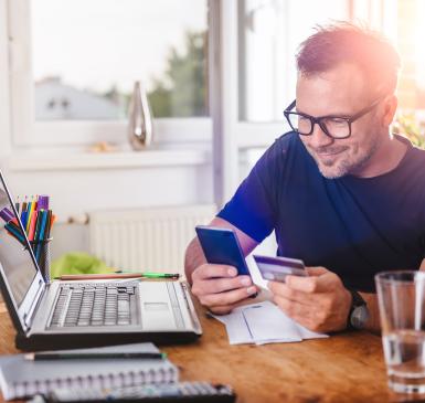 main with credit card, phone, laptop