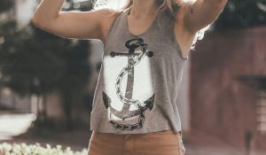 Image: woman wearing shirt with anchor on it. Topic: Does "Made in the USA" Mean Not In a Sweatshop?