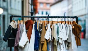 Image: children's clothing hanging. Title: Toxic Textiles Update: Carter’s First Sustainability Report