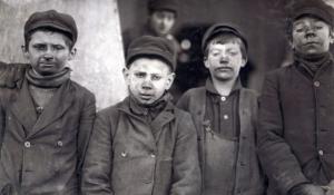 Group of “breaker boys,” who separated coal impurities by hand, in Pittston, Pennsylvania. Photo by Lewis Wickes Hine, 1911.