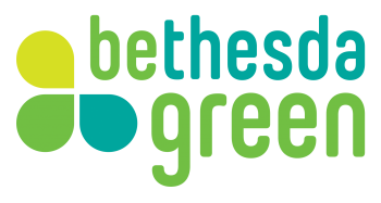 The Bethesda Green logo has 3 flower petals next to the words "Bethesda Green" with the letters "be" and "green" highlighted in a green color as if to read "Be Green"